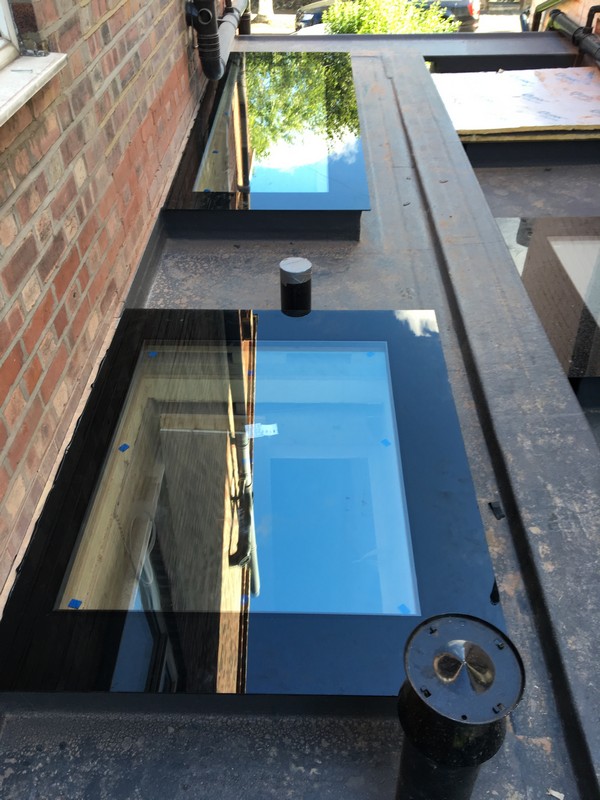 Multiple flat roof skylights on extension in Hackney